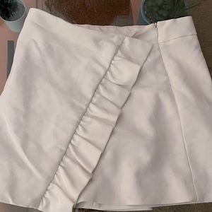 It’s white, Zara bottoms.